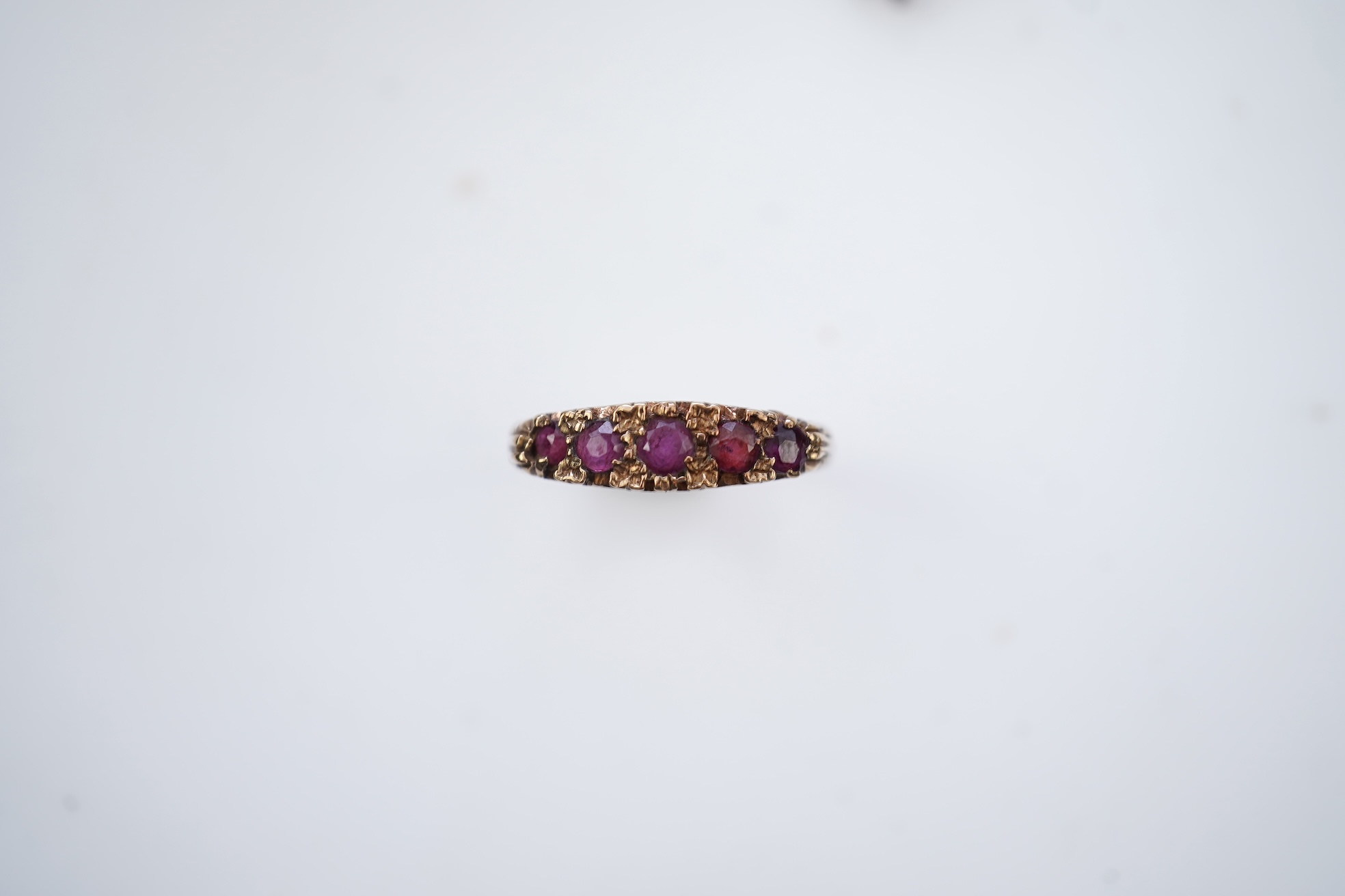 Three rings and a brooch